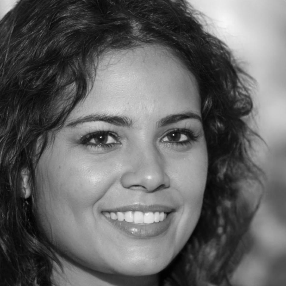 Professional headshot of financial analysis expert