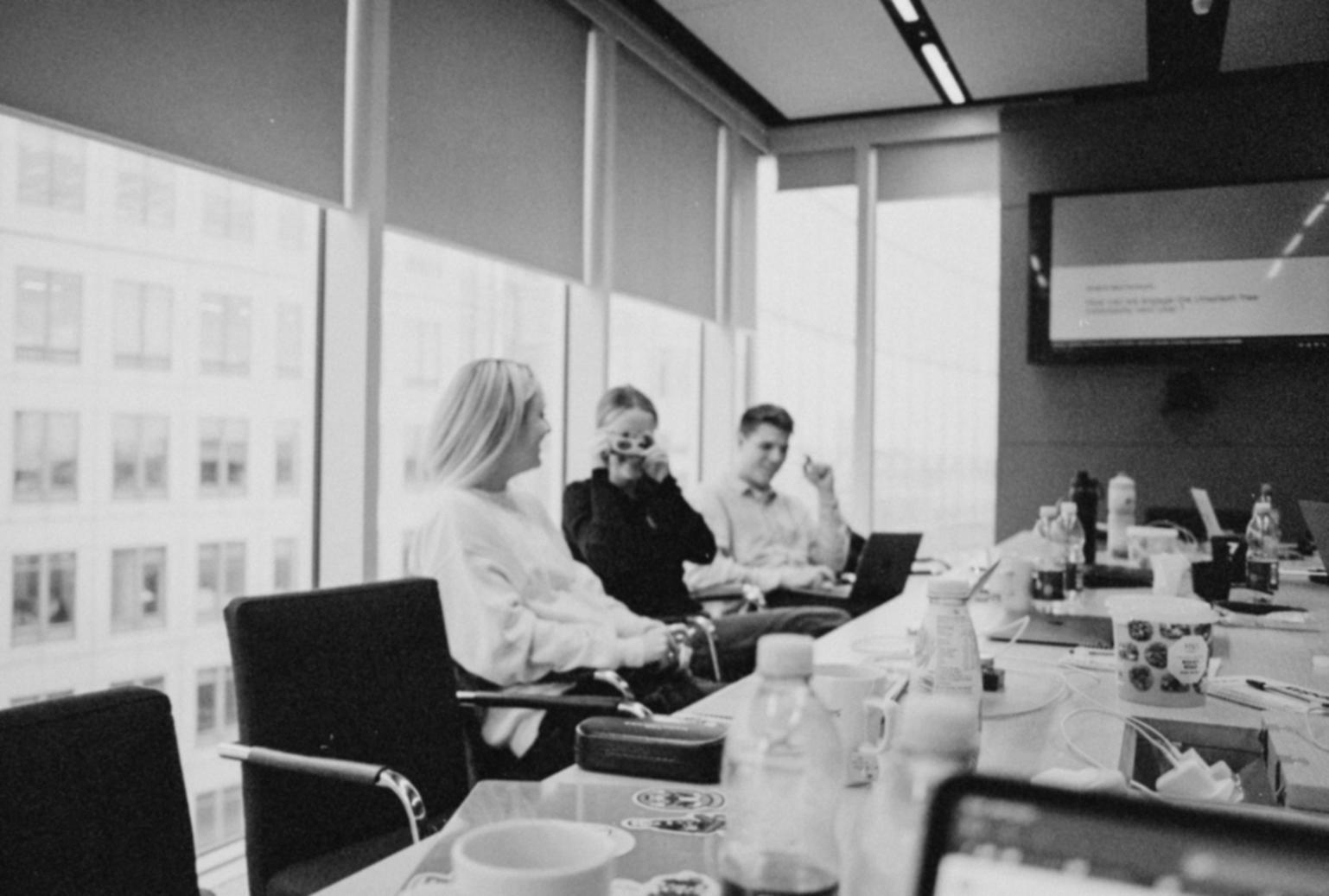 Professional consultation session with financial documents and analysis tools